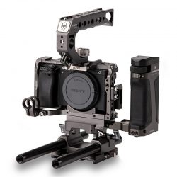 Cover photo for the The Tilta Sony A6 series Kit C comes with a cage, 2 handles, one for the top and one for the side, and finally a baseplate with 15mm rods